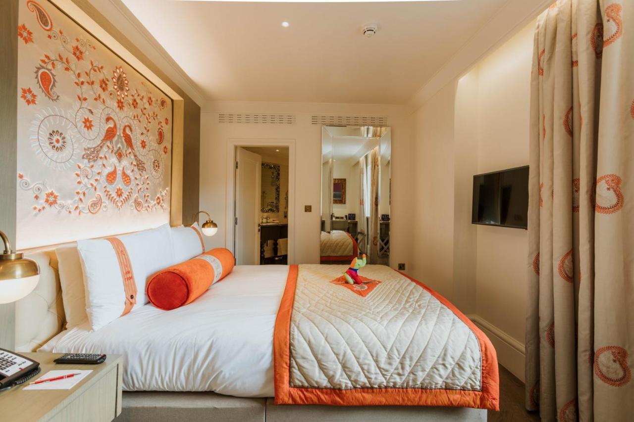 The Lalit London Ξενοδοχείο Εξωτερικό φωτογραφία A bedroom at the Mandarin Oriental London